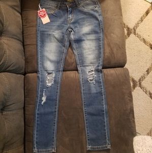 Distressed ripped jeans blue medium wash